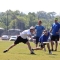 land--A member of the Four Horsemen ultimate team throws around his defender during a tournament in Nashville, TN.